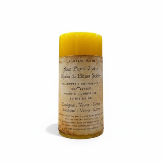 Handcrafted yellow candle made with eucalyptus, vetiver and lemon, and Used to balance your solar plexus chakra, and for willpower, confidence, self~esteem, and purpose
