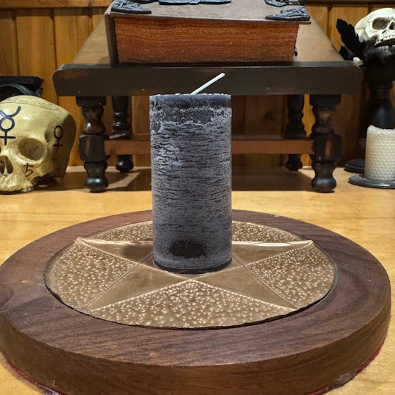 black candle handcrafted in ritual space