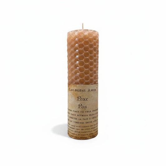 Handcrafted pink beeswax spell candle made with a blend of essential oils and Used to bring peace to your environment, or to bring peace between friends or family