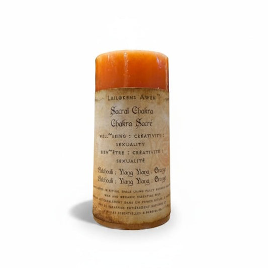 Handcrafted orange candle made with patchouli, ylang ylang and orange, and used to balance your sacral chakra, and for well~being, creativity, sexuality, and love