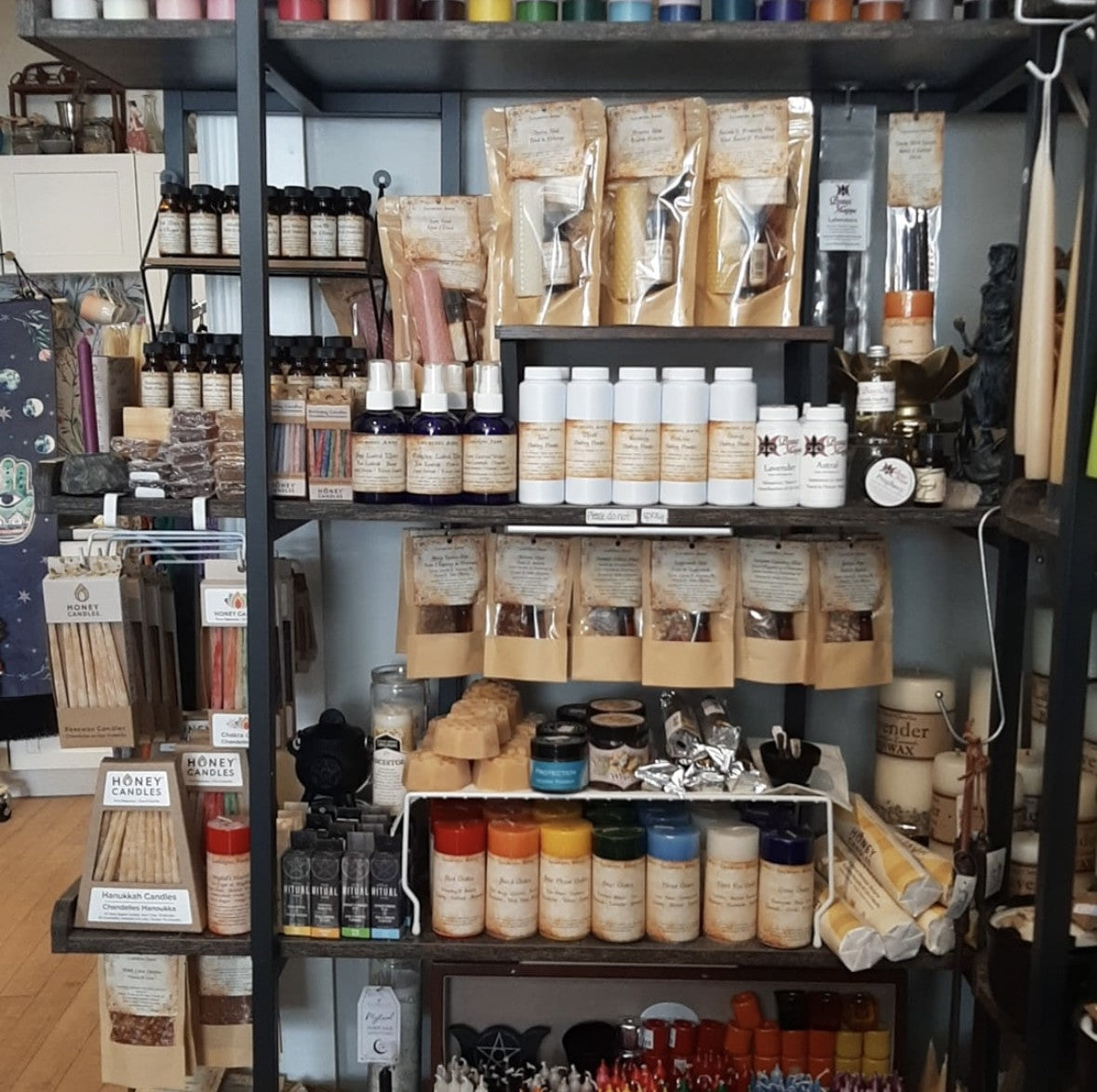 Lailokens Awen products handcrafted in ritual space on display in a store