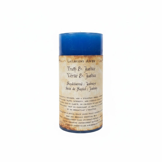 Handcrafted blue candle scented with sandalwood and jasmine, and used for truth and justice