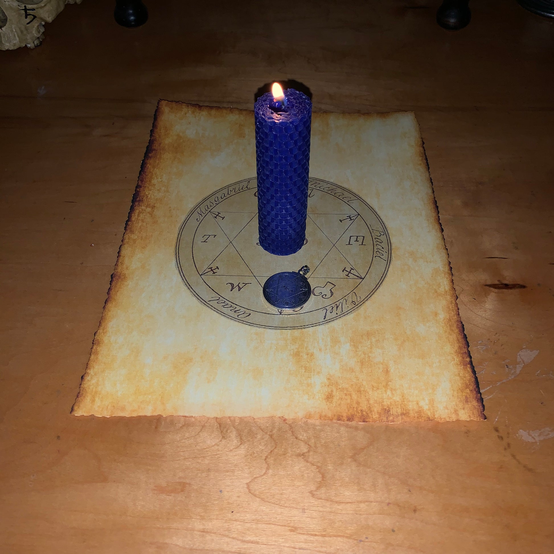 blue candle handcrafted in ritual space