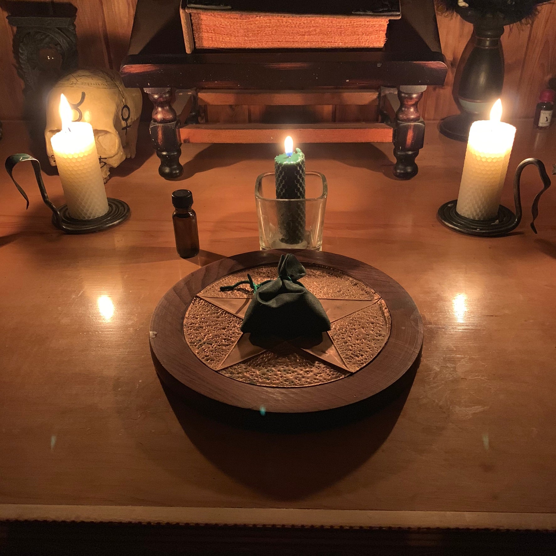 dark green beeswax spell candle handcrafted in ritual space